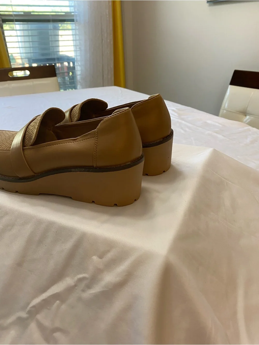 Woman’s Classic Tan Slip-On Loafers with Textured Vamp